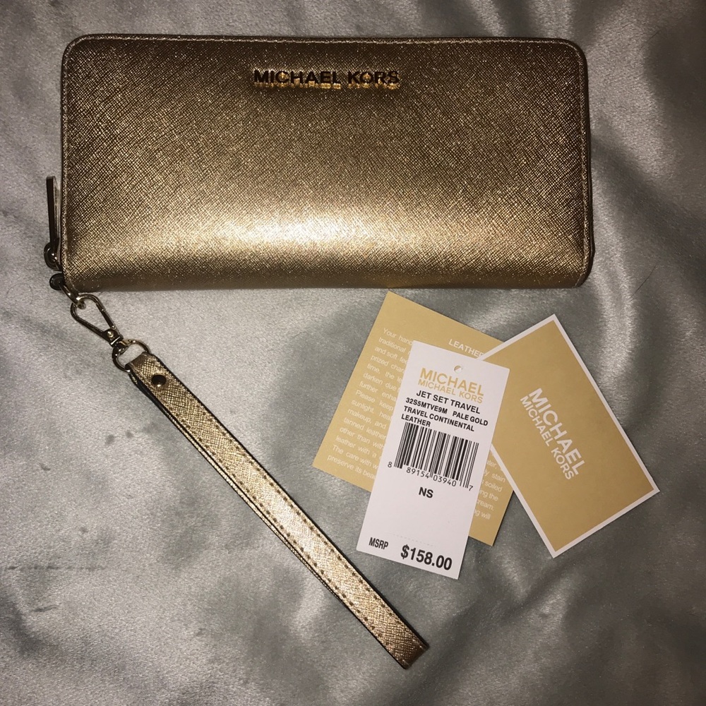 MICHAEL KORS Jet Sept Gold Wallet Wristlet